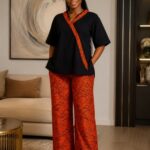 Women’s Two Piece Palazzo Set Black Trim Top and Orange Wave Wide Leg Trousers